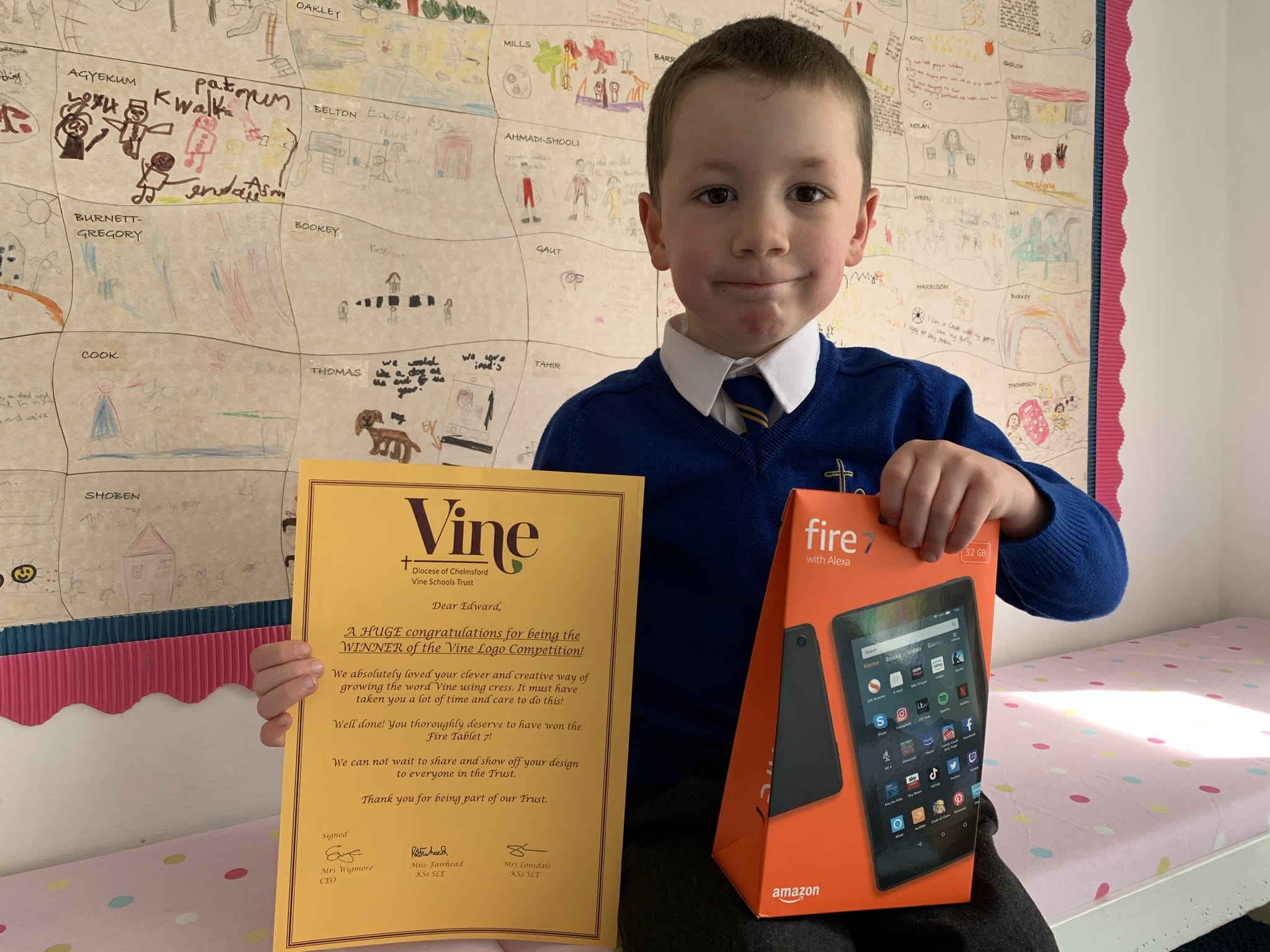 Pupil from Orsett Church of England Primary School, Edward, wining first prize for the Vine Logo Competition