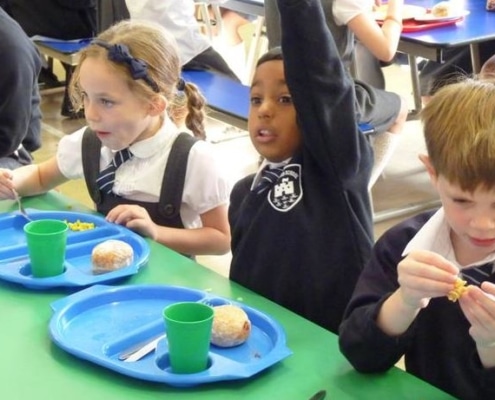 Pupils at Bulphan Primary in the school canteen