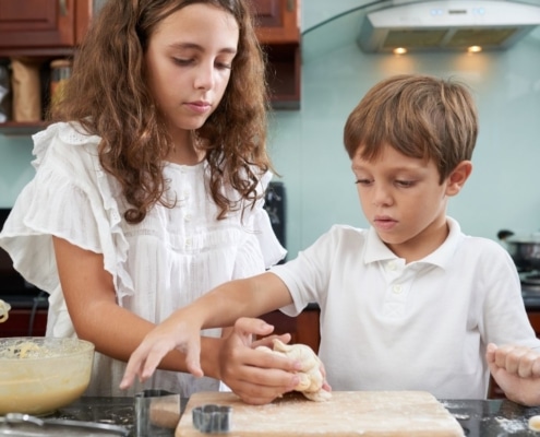 Young children baking together