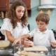 Young children baking together