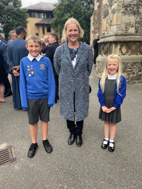 Rivenhall C of E Primary School students standing with MP Vicky Ford