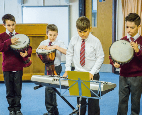 Group of students playing musical instruments